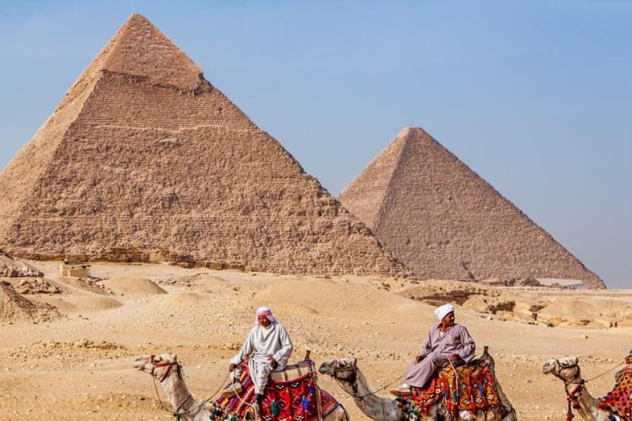 Giza Pyramids with camel riders